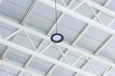 LED lighting lamp on a top roof of warehouse.の写真素材