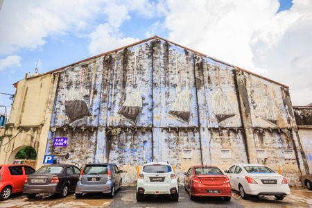 IPOH, PERAK, MALAYSIA - APRIL 14, 2017: A "Kopi" Break at Jalan Tun Sambathan(beside a carpark near Maybank) painted by Ernest Zacharevic in Ipoh, Malaysia.のeditorial素材