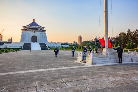 TAIPEI, TAIWAN - APRIL 30, 2017 : Soldier raise the flag in the morning at Chiang Kai-shek memorial hall, a famous monument, tourist attraction and landmark of Taipei, Taiwan.のeditorial素材
