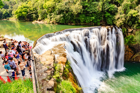TAIPEI, TAIWAN - APRIL 30, 2017: Unidentified people visit Shifen waterfall Scenic Area, Shifen waterfall is located at Pingxi township in Taipei, Taiwan.のeditorial素材