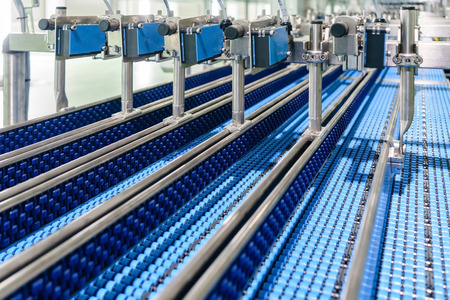 Empty conveyor belt of production line, part of industrial equipmentの写真素材