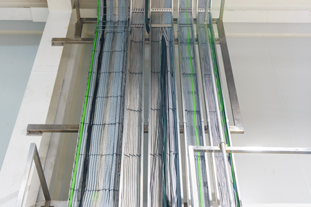 The electrical wiring of building,a cable tray system used to support insulation electrical cables.