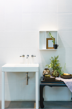 Interior of bathroom with sink basin faucet and mirror. Modern design of bathroomの写真素材