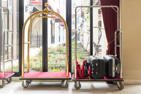 Hotel luggage cart / baggage trolley in the hotel lobby hallway background or Bellman's luggage cartの写真素材
