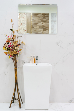 Interior of bathroom with sink basin faucet and mirror. Modern design of bathroomの写真素材