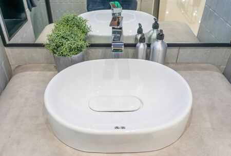 beautiful luxury faucet and sink decoration in bathroom interiorの写真素材