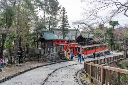NAGOYA, JAPAN - JANUARY 18, 2020: The main red entrance gate of Osu walking street, one of the famous marketplace and shopping attractions in Nagoya City, with some tourists.のeditorial素材
