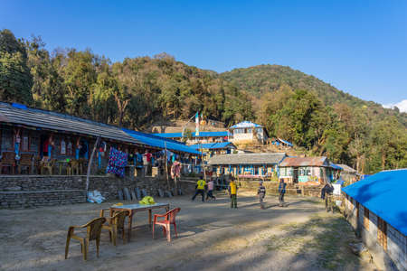 View of Forest Camp Guest House & Restaurant on Mardi Himal trek at blue sky, Annapurna mountain range in Nepalのeditorial素材