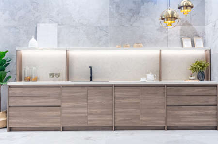 Bright modern kitchen with stainless steel appliances. Interior design.の写真素材