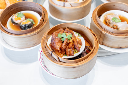 Chinese dim sum in bamboo steamer - chinese food style, selective focus pointの写真素材