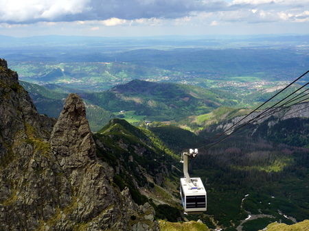 The cable car approaching to the summit of Kasprowy Wierch Mountain in Tatra Mountains, Poland
