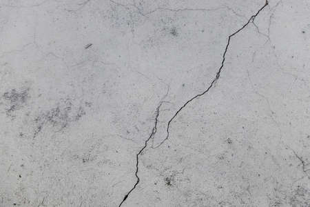 background old concrete wall with remnants of plaster with copy space for text or image