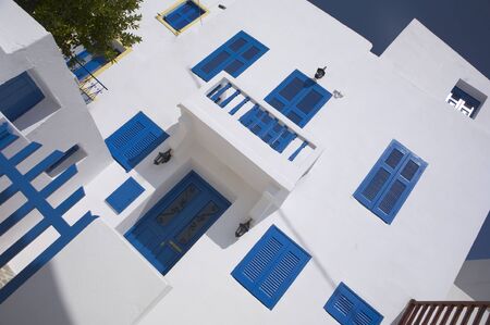 cute typical greek house in blue white stillの写真素材
