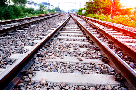 Railroad track at the time of sunset.の写真素材