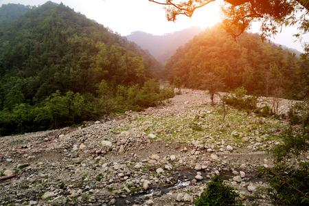 Elevated view of dried river in mountain range.