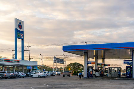Khon Kaen, Thailand - December 24, 2017: View of Gas station with clouds and blue sky in evening time, Thai petrol pump in the rural areaのeditorial素材
