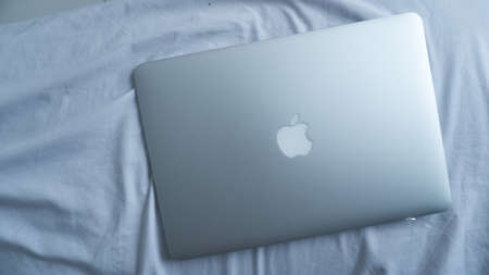 Jakarta, Indonesia - February 16, 2021: Apple MacBook Air Silver 2017 use for work from home...