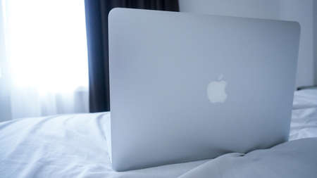 Jakarta, Indonesia - February 16, 2021: Apple MacBook Air Silver 2017 use for work from home captured in close upのeditorial素材