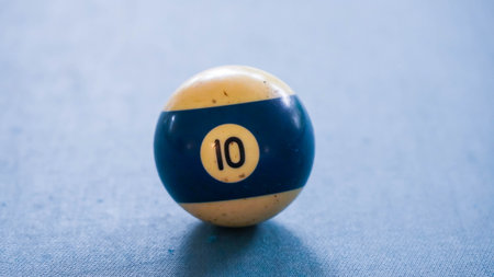 Pool ball number 10 on a blue background. Billiard balls.