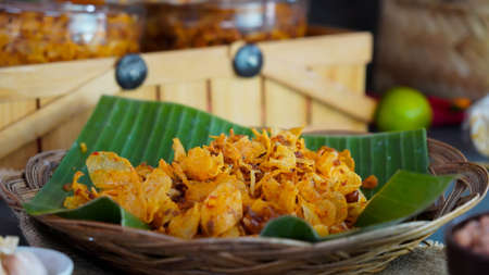 Sambal kering kentang is spicy crispy stick made from potatoes also called pencok or mustofaの写真素材