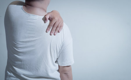 Man suffering from pain in shoulder, Health care and medical concept.