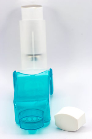 Asthma inhalers on a white backgroundの写真素材