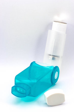 Asthma inhalers on a white backgroundの写真素材