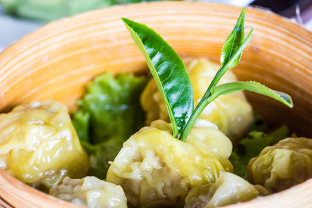 Chinese steamed dimsum in bamboo containerの写真素材