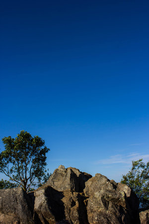The rock and blue sky