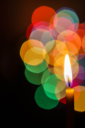 candle light at night with color bokehの写真素材
