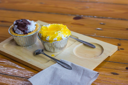 2 cups of cake in a wood plate