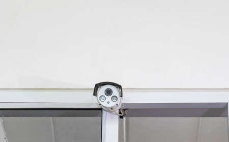 white security surveillance cameraの写真素材