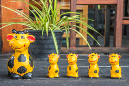 cute girafe doll on wood floor
