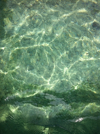 A clear summer water of the sea taken at puerto galera mindoro philippinesの素材