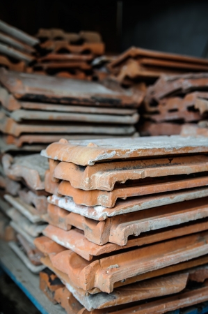 stack of the orange tiles in warehouseの写真素材