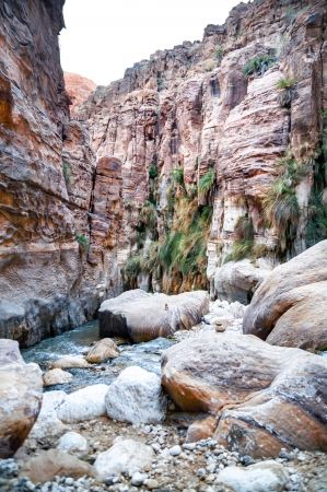 Landscape of the rocky mouth of the creek in Wadi Hasaの写真素材
