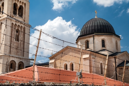 Lutheran Church of the Redeemer behind the barbed wireの写真素材