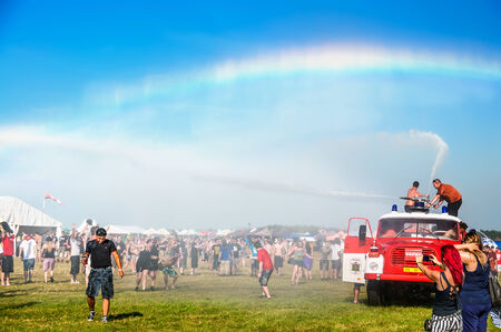 Water from a fire truck creates a rainbow at Mighty Sounds festival 19th of July, 2013のeditorial素材
