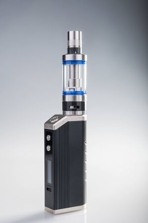 E-cig box mod on gray and white background