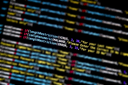 Screen of source code and abstract technology background, Developer and programming with coding, Computer virus and Mal ware attackの写真素材