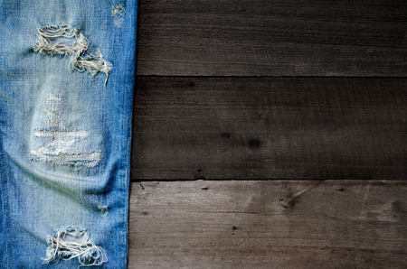 Jeans lack and jeans pattern texture background, blue jeans texture, jeans lack on the wooden floorの写真素材