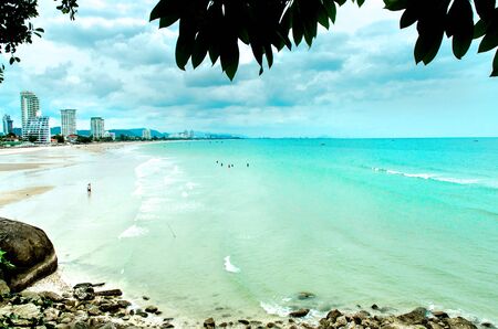 The view of sand beach and sea wave with rock and cloudy on afternoon, Beautiful of sand beach and...
