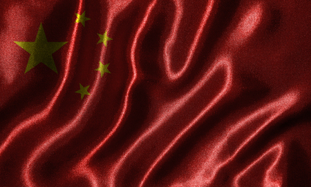 China flag - Fabric flag of China country, Background and wallpaper of waving flag by textile.の写真素材