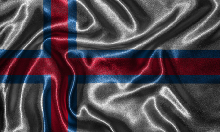 Faroe Islands flag - Fabric flag of Faroe Islands country, Background and wallpaper of waving flag by textile.の写真素材