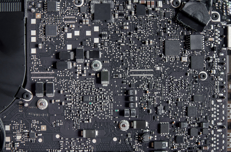 Close-up of circuit board and electronic computer hardware, Repairing technology of computer and laptop, Repair of electronic control panel, motherboard, RAM, CPU, digital chip and microprocessor.の写真素材