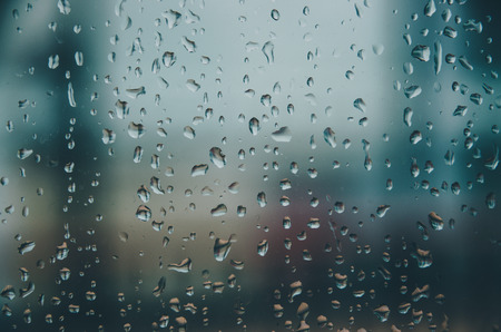 Wallpaper of rain drops or water drops on the glass, Vintage background by rainy drop on window,...