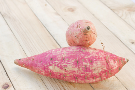 Sweet potato form japan on the wood background.の写真素材