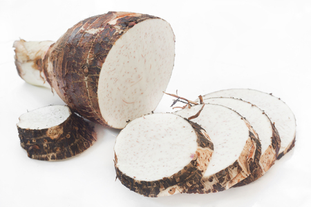 Taro root on white background.の写真素材