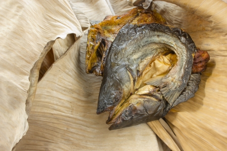 closeup dry fish on dry banana leafの写真素材