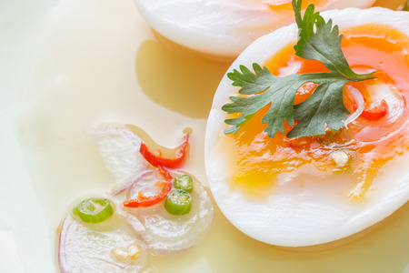 Close up Soft Boiled Eggs Spicy Salad.の写真素材